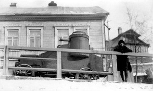 Mark Moody inside General Rozanov's headquarters guard line, by armored car