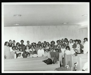 Group of children & women (including Berneise Crockett) in a church, Texas