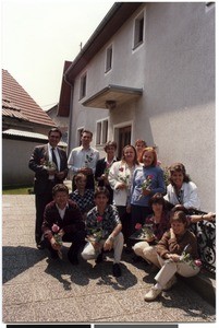 Group photograph of Mihael Kuzmič with students of the course outside of the church building