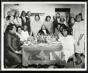 Unidentified group of people around the kitchen table, Texas