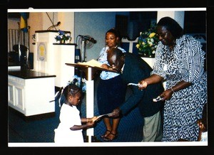 Grant & Harrison giving certificates to students, Bahamas, 2003