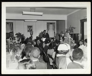 Unidentified group of people at a banquet, COGIC