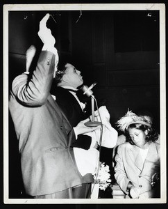 2 unidentified men and a woman, COGIC gathering, Chicago, 1961