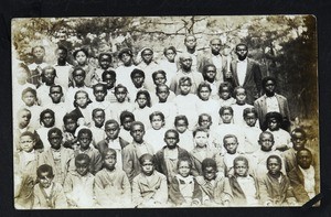 Unidentified groups of people and buildings, Texas