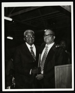 2 unidentified men with a COGIC award, Chicago