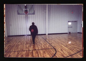 Unidentified man playing basketball