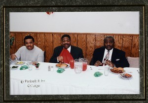 3 unidentified men eating lunch, Chicago