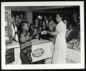 Children drinking Double Cola at a food counter, Memphis