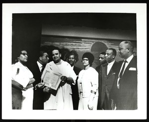 8 unidentified people at a COGIC award ceremony, Chicago