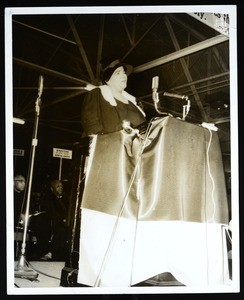Unidentified woman speaking at an unidentified COGIC conference
