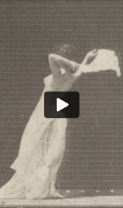 Semi-nude woman throwing handkerchief around shoulders