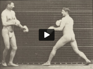 Two men in thong underwear boxing with gloves