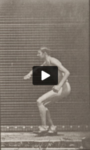 Man in pelvis cloth running and jumping horizontal bar