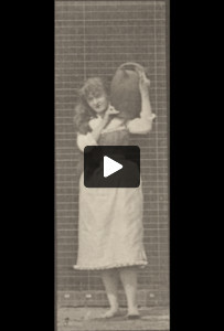 Draped woman making miscellaneous movements with a water jar