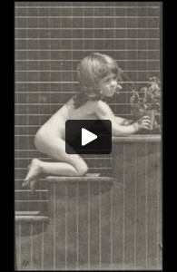 Nude child walking on stairs