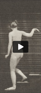 Nude woman descending stairs