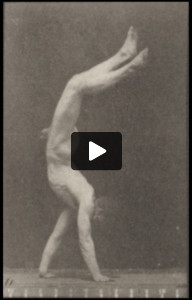 Nude man walking on hands