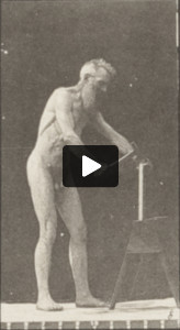 Nude man using a hatchet