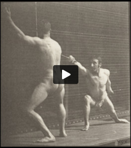 Two men in pelvis clothes fencing