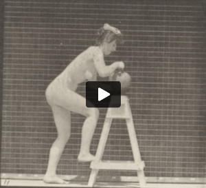 Nude woman bending over a trestle with a water jar