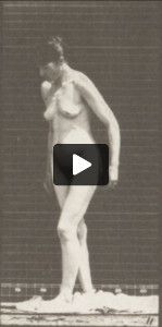 Nude woman taking off clothing