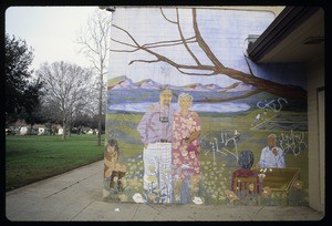 Senior couple posing in front of a park-like landscape, Van Nuys, 1976