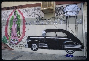 Religious and gang imagery, Los Angeles, 1990