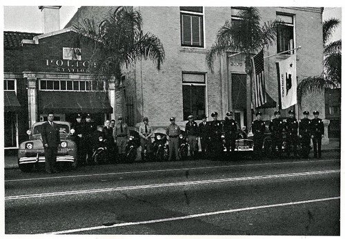 Police Officers with Cars and Motorcycles