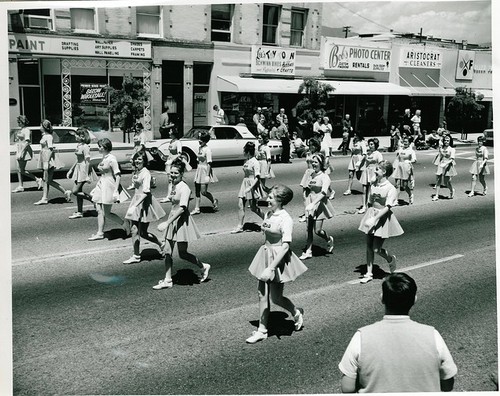 Scout Day Parade: Young Women in Uniforms Marching on Mission