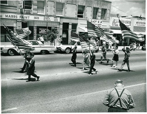 Scout Day Parade: Scouting Representatives Marching with Flags