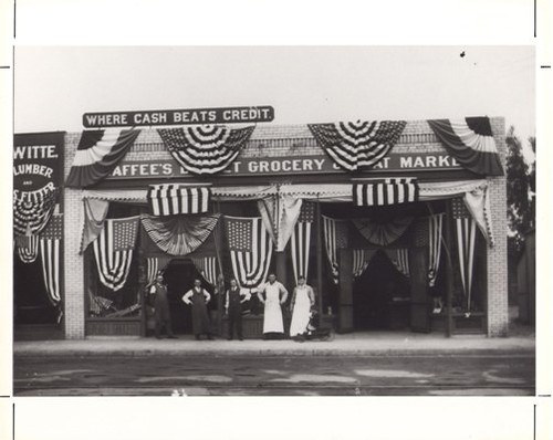 Employees Posing at Chaffee's Basket Grocery at 1012 Mission