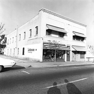 Business Building on Mission: Advertising on Side for Lathhouse, The Braided Rug