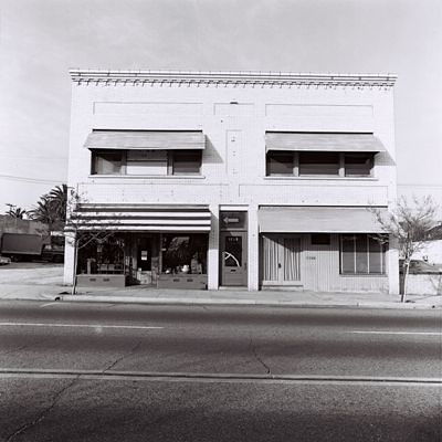 Business Building on Mission: Advertising on Side for Lathhouse, The Braided Rug