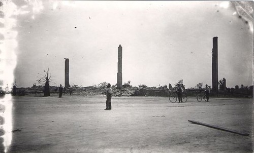 Men Viewing Ruins of First Raymond Hotel After the Fire