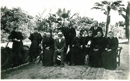 Unidentified Family Group (Rust?), Woman with Bicycle