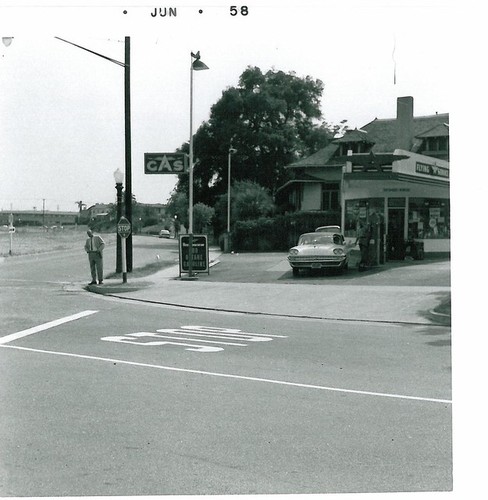 C. H. Lane on Street Corner at Flying A Service Station