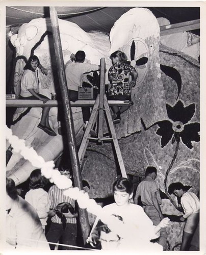 Putting Flowers on 1959 Float