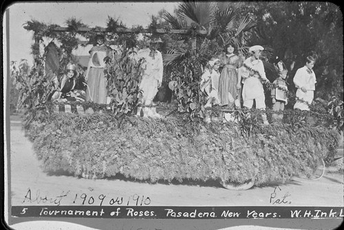 Costumed Group on Foliage-Decorated Float