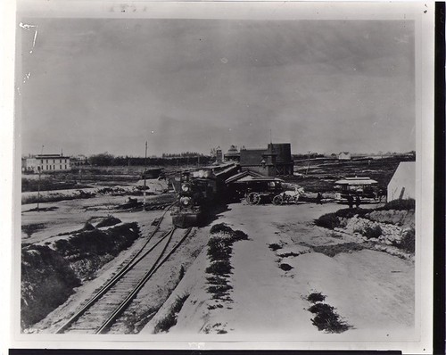 Old Raymond Railroad Station with Train Engine and Horse Carriage