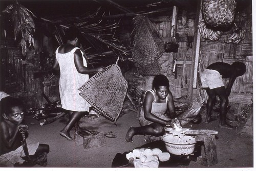 Esta grates yams for lap lap in the interior kitchen