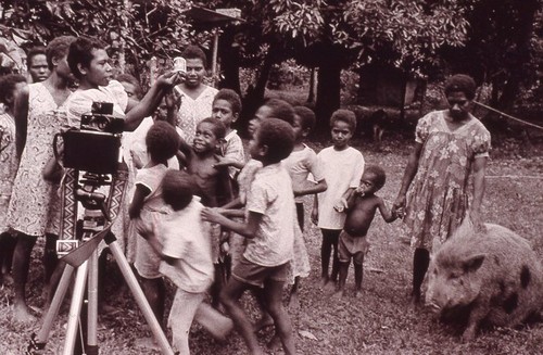 Children excited to see Polaroid photo