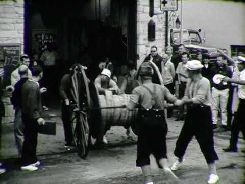 Fire Fighters Compete in Hose Cart Race