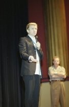 Baz Luhrmann speaking onstage, 2002