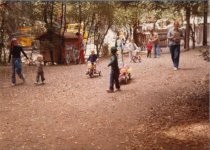 Children on wagons and bicycles at Homestead Valley's July 4th Parade, 1974