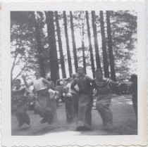 Children participating in a sack race, 1956