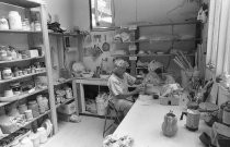 A potter at work at the O'Hanlon Center for the Arts, date unknown