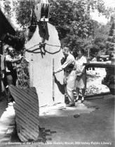 Installation of O'Hanlon sculpture at library, 1966