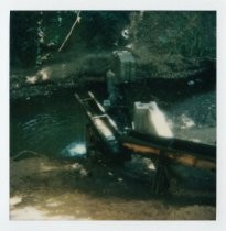 Color photo of flume during rains in Old Mill Park, 1984