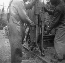 Removing the railroad tracks on Miller Ave., circa 1955