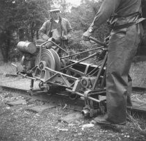 Removing the railroad tracks on Miller Ave., circa 1955